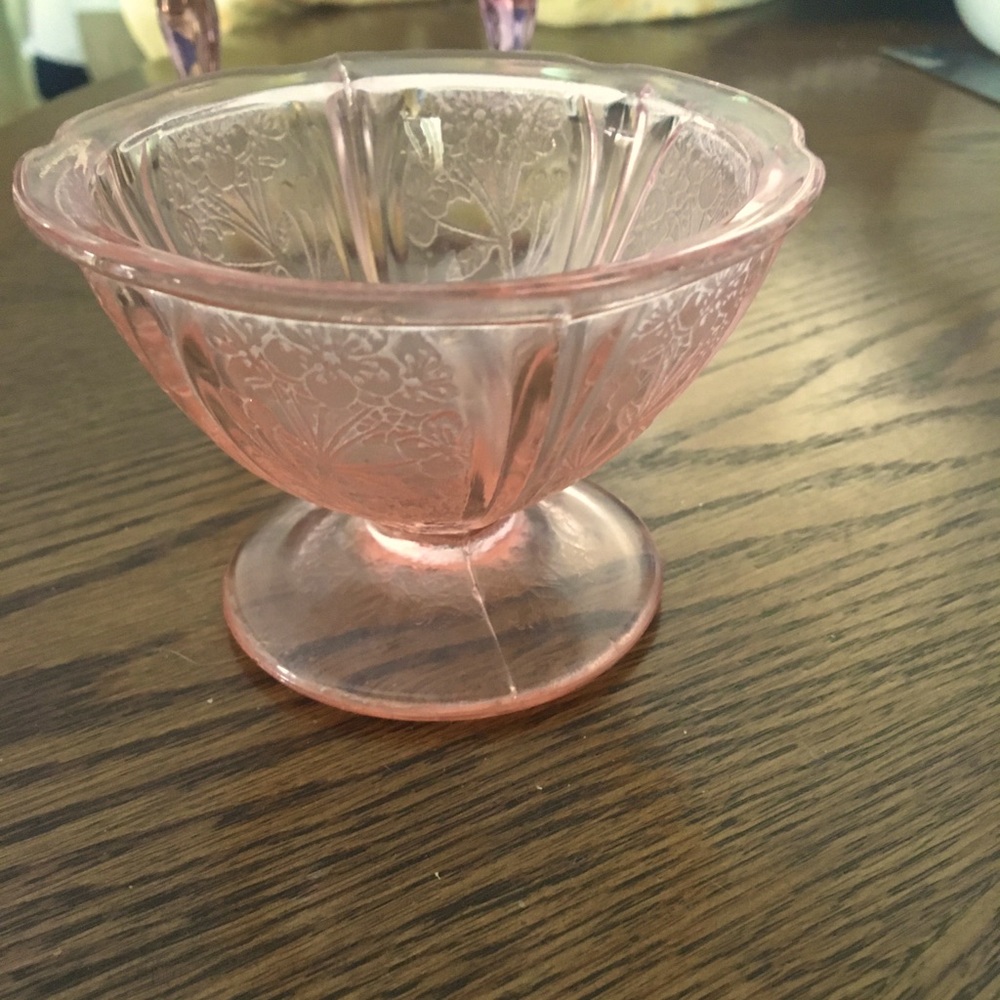 Pink glass bowl could hold candy/accessories